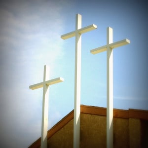 3 crosses on trop of a building