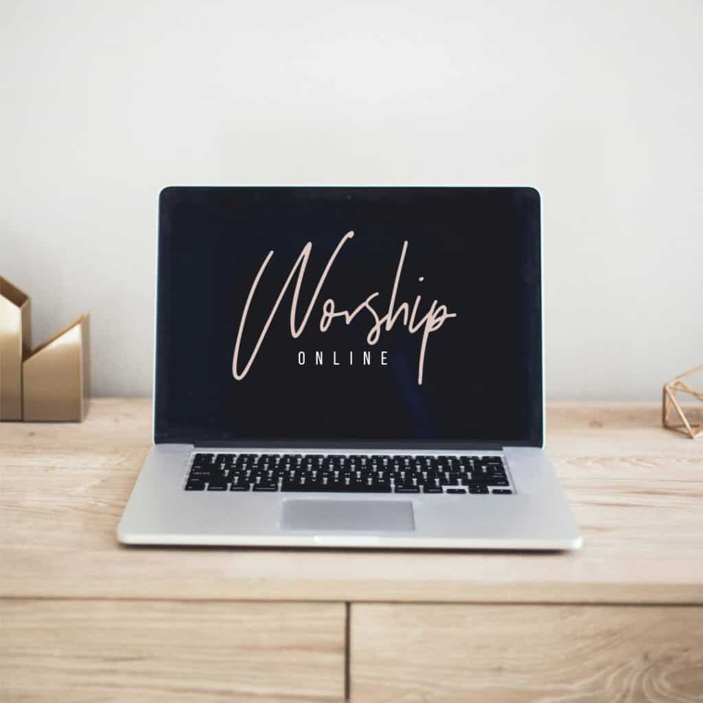 worship online written on a laptop on a desktop